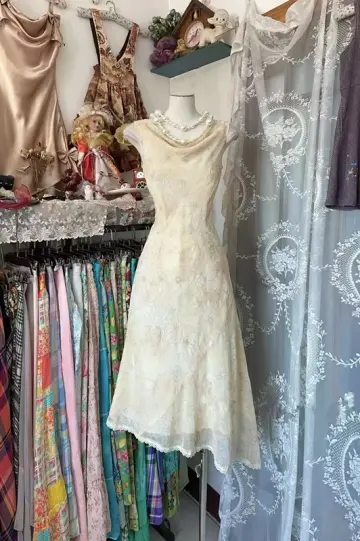 Light apricot floral sleeveless fitted waist midi ball gown R7513