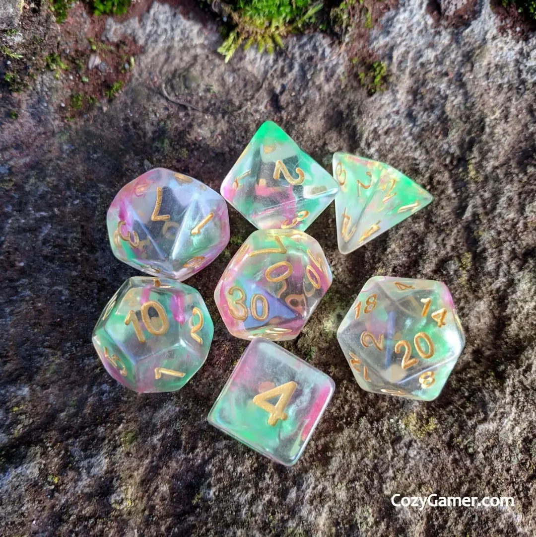 Charmer Dice Set – 7-Piece Pink Green Swirl Charisma DnD Dice