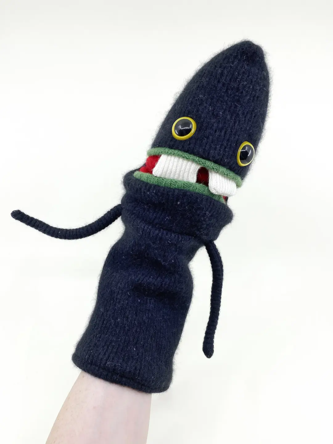monster hand puppet named Andy