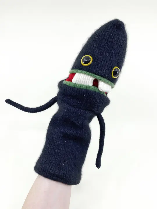 monster hand puppet named Andy