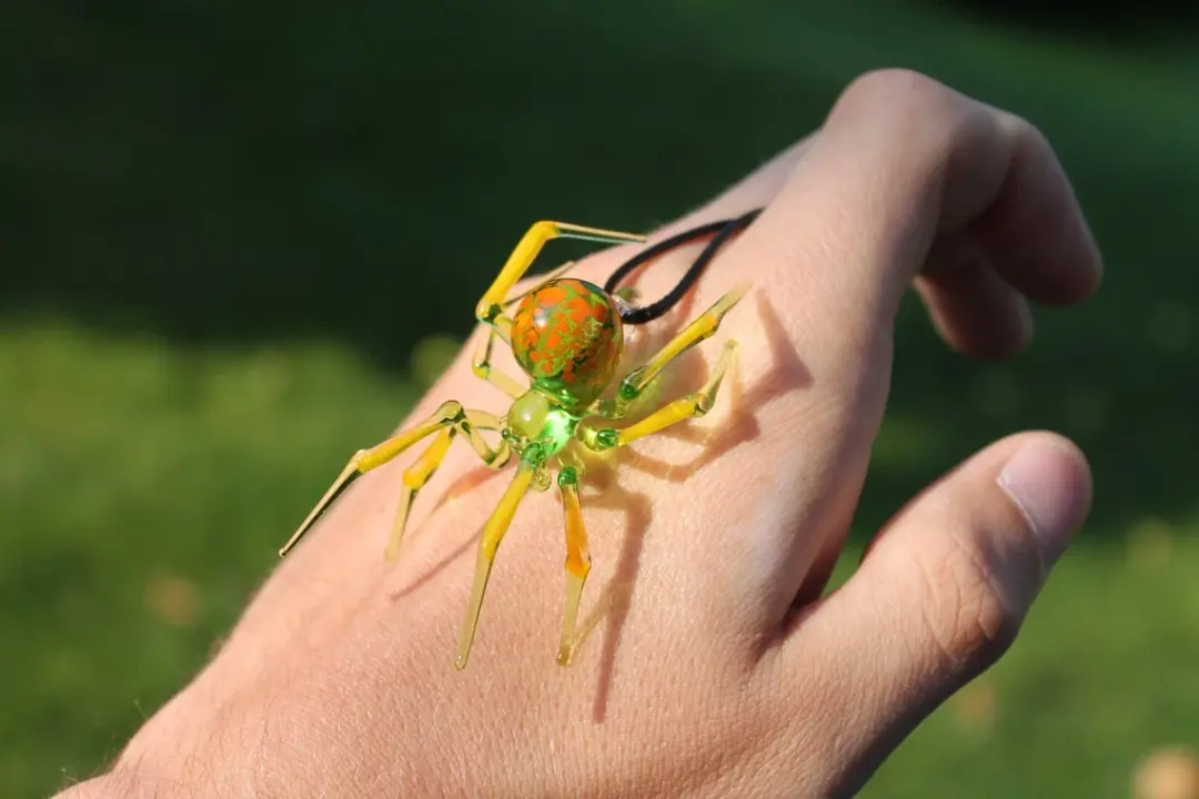 Green And Orange Glass Spider Pendant Necklace For Art Lovers