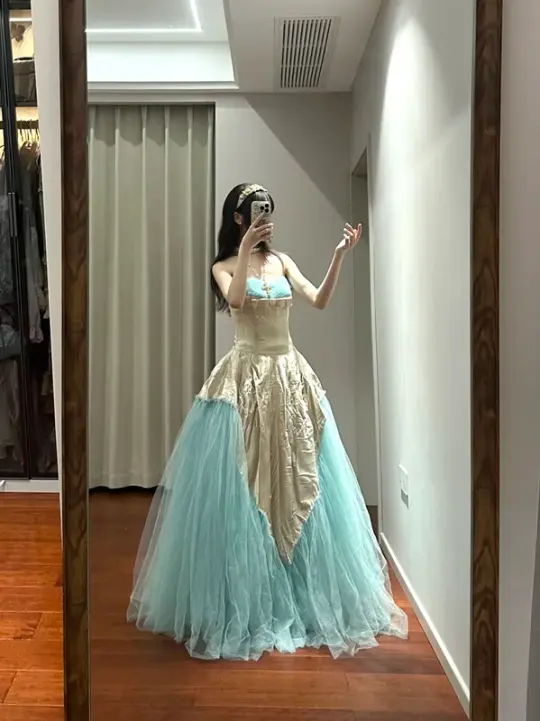 Champagne-colored strapless, fitted, long ball gown with a lake blue skirt R8853