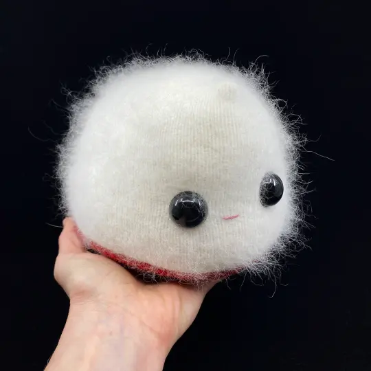 Felicia the fluffy white angora monster