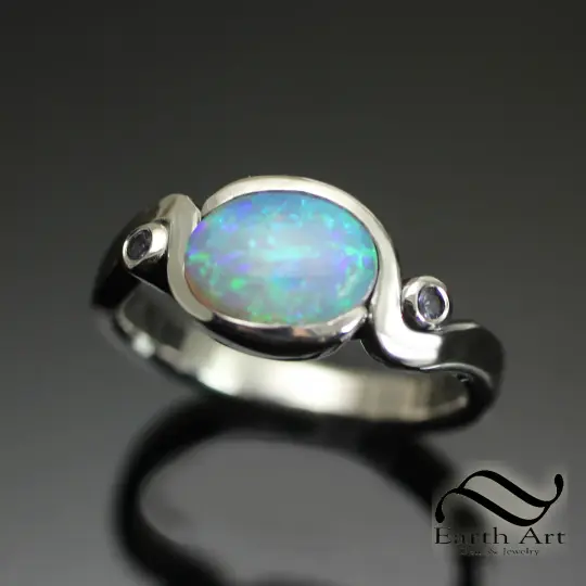 Australian Opal Bypass ring with Tanzanite