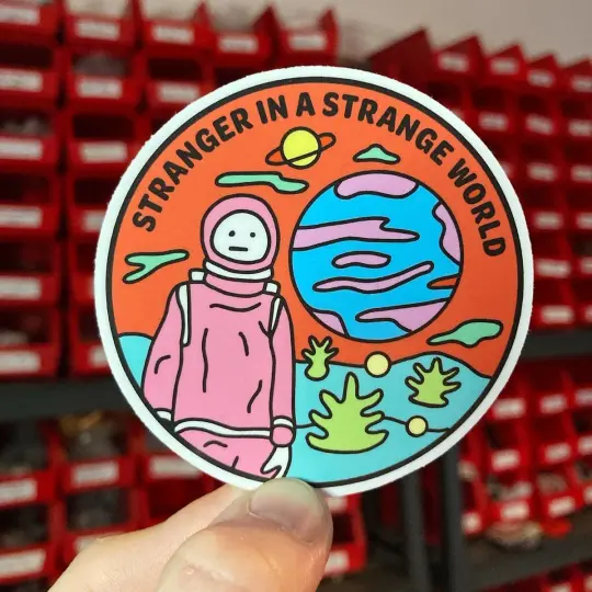 Stranger in a strange world sticker