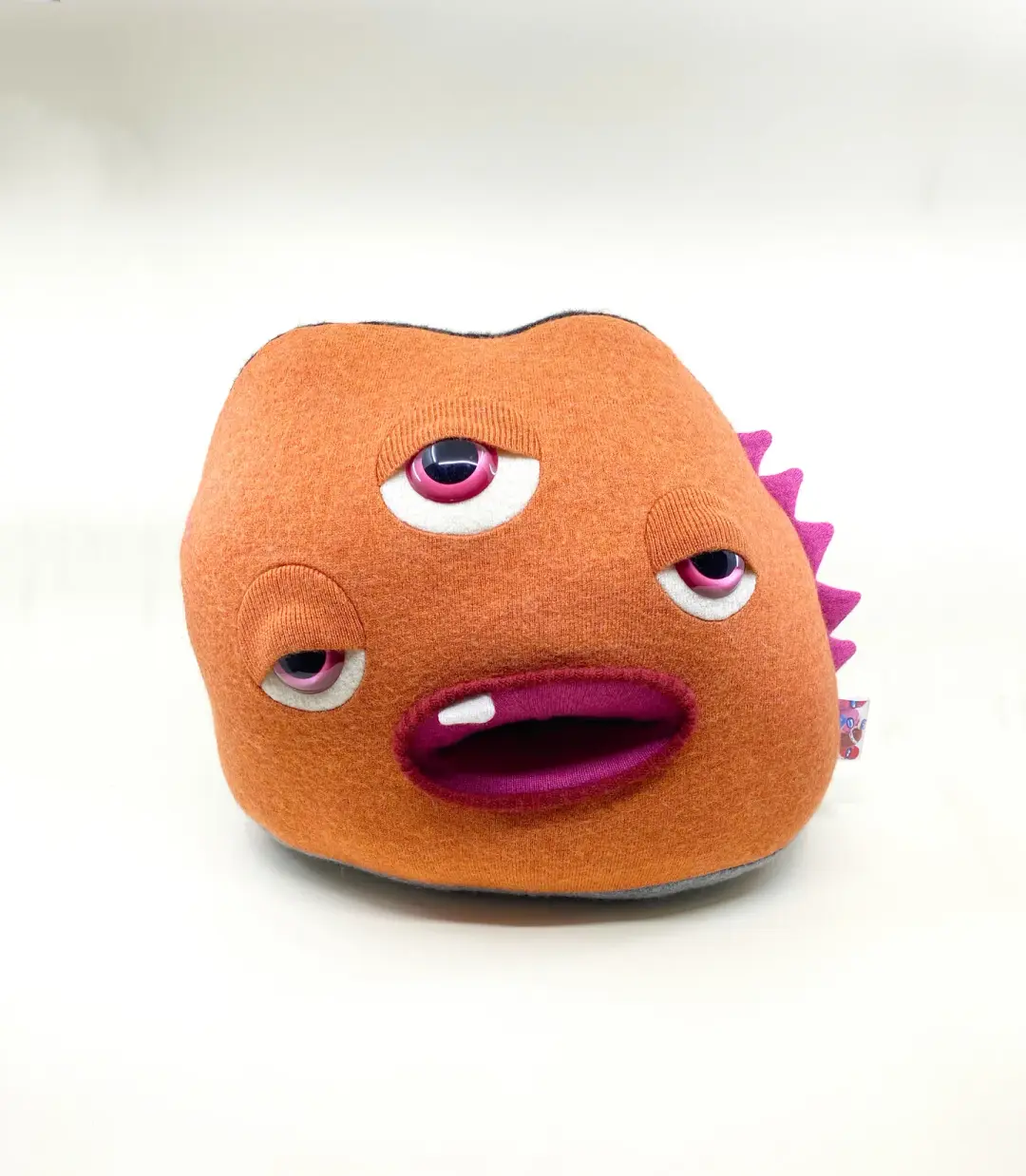 Swanson the orange three-eyed monster