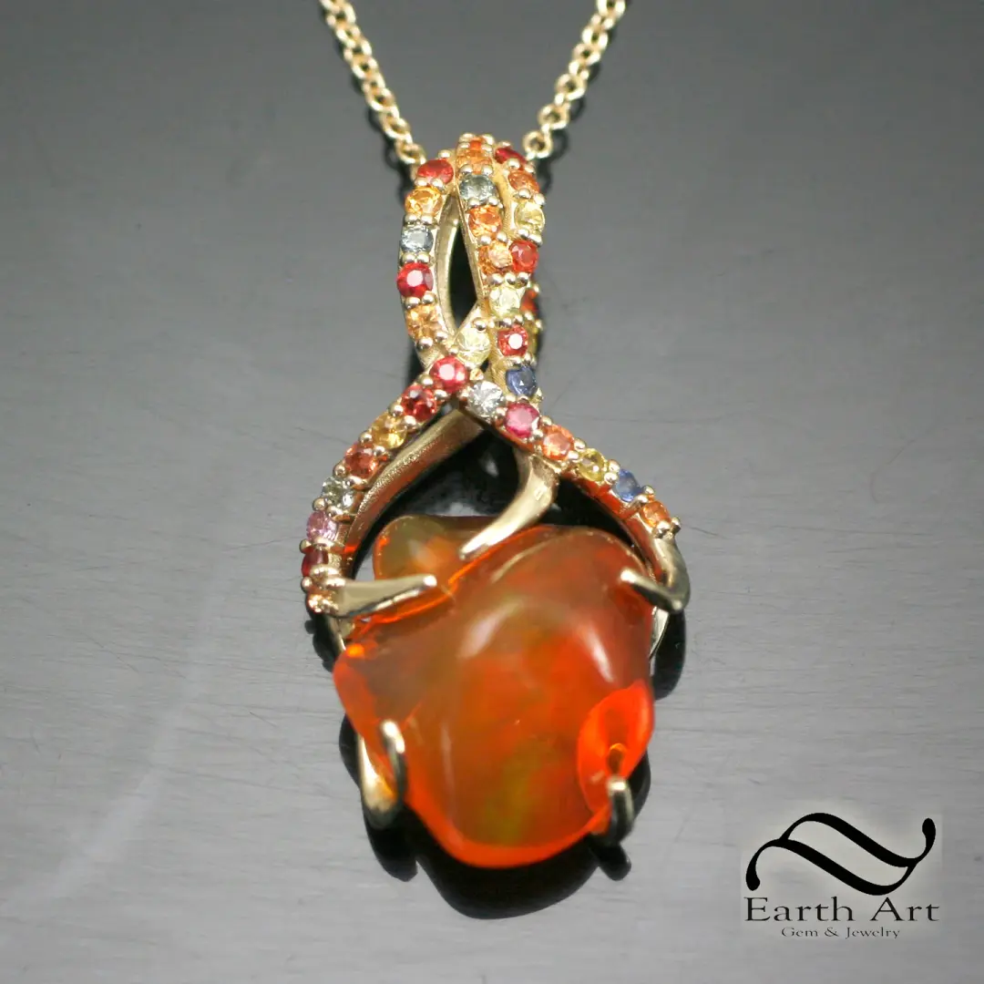 Carved Mexican Fire Opal in 14k with sapphires