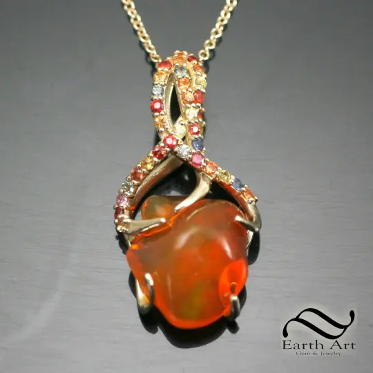 Carved Mexican Fire Opal in 14k with sapphires