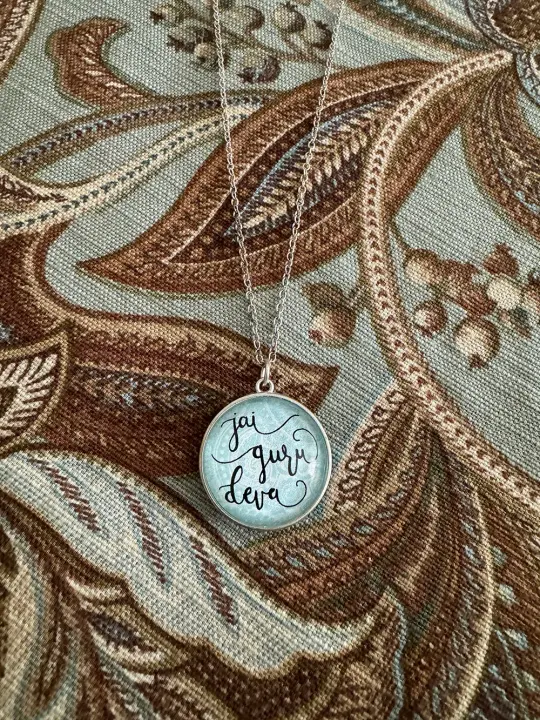 Across the Universe Inspired Pendant.