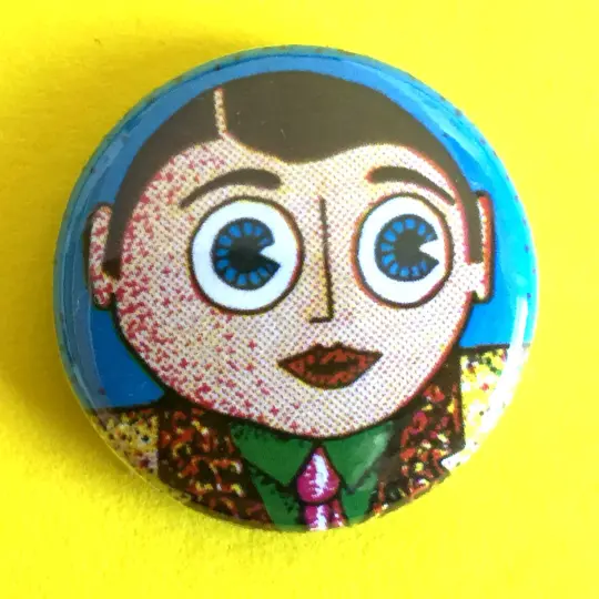 Showbiz Frank 25mm badge