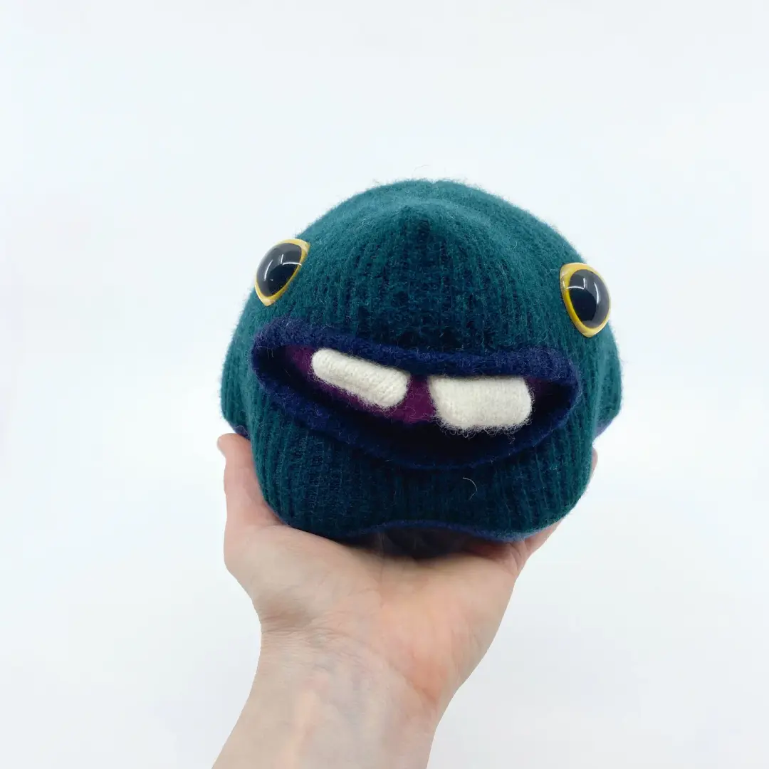 Brock the friendly monster plushie with two teeth