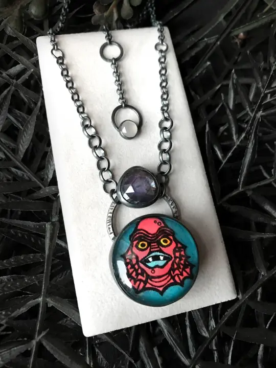 Pink Creature with Sapphire Pendant