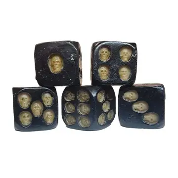 A set of five black, six-sided dice stacked against a white background. The traditional dots on the dice are replaced with small, recessed bone-colored skulls.