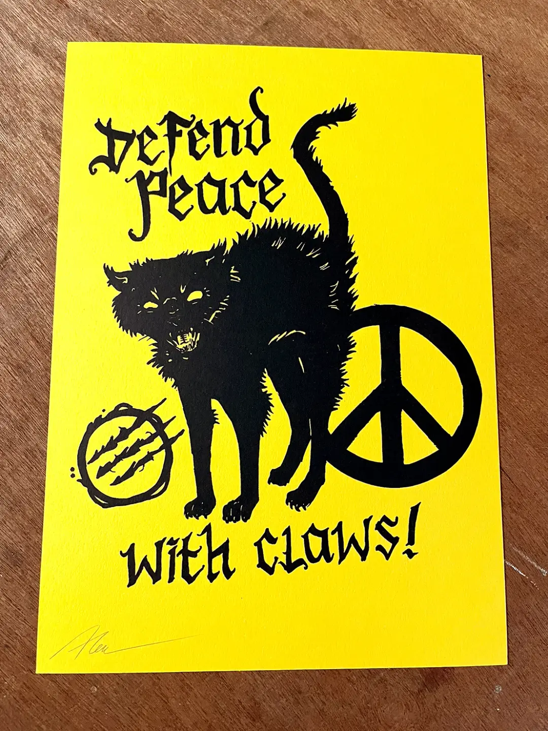 'Defend peace - with claws!' Risograph print