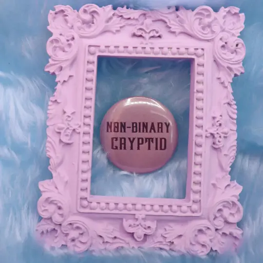 Non-binary Cryptid Button Badge