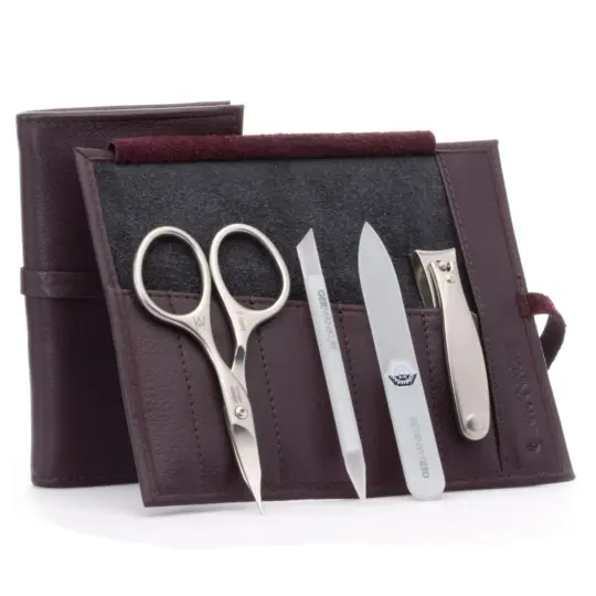 GERMANIKURE -  Four Piece Set:  Scissors, Clippers, Glass File, Manicure Stick in Dark Purple Leather