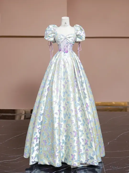 Off-white base with light purple butterfly print, fitted waist, long ball gown with a full skirt R8337