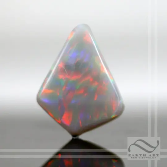 Solid Australian Opal with Ribbon Mackerel color play 6.28 carats