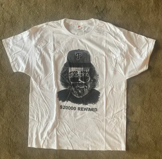 Jerry wearing a P hat shirt (XL)