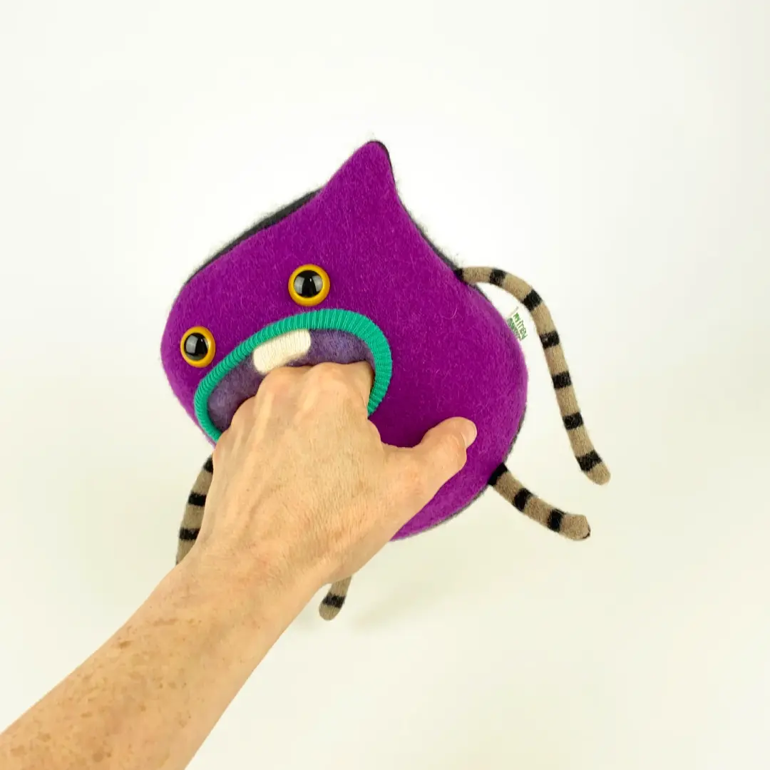 Waffles the handmade plush sweater monster
