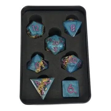 Sharp edge DnD dice set, pearly teal resin with a gold leaf streak and magenta numbers, 7 dice in a Project Kirtrite tin