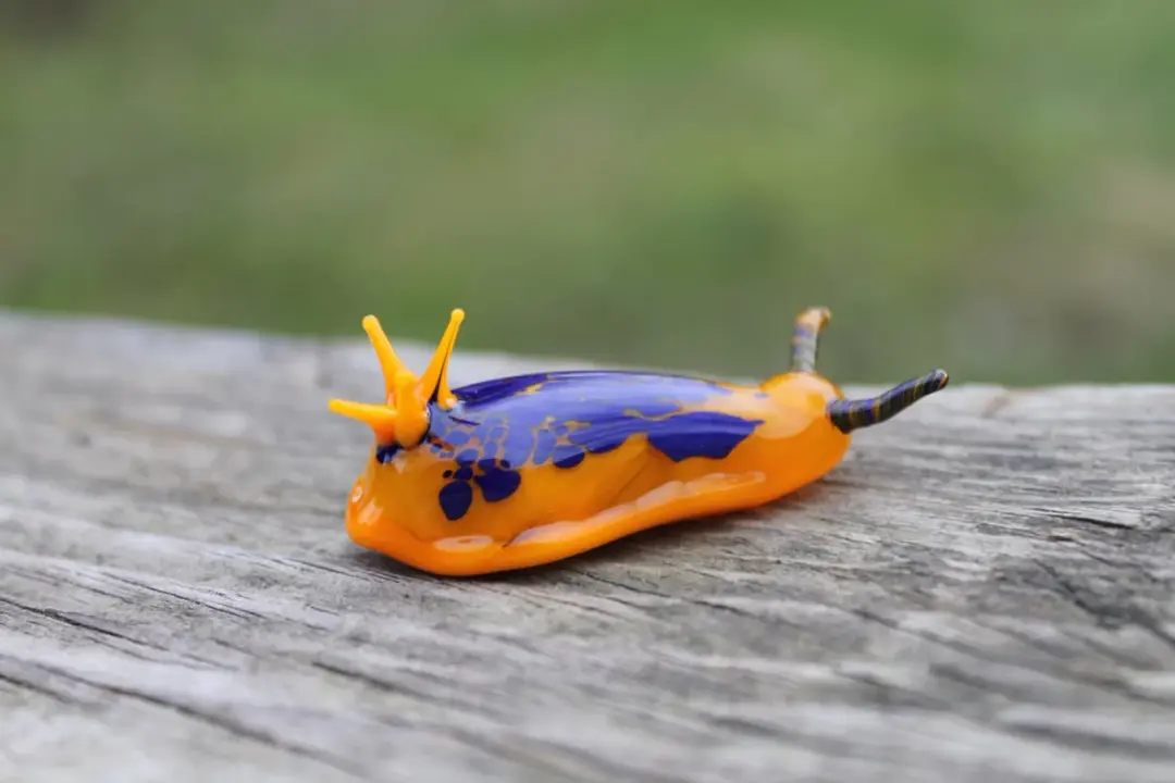 Vibrant Orange And Blue Glass Sea Slug Figurine 2 Inches