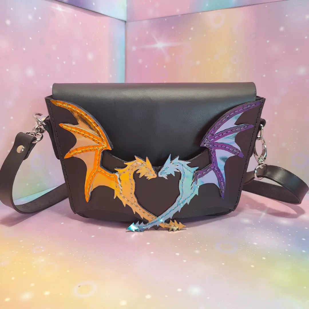 Black leather clutch bag with dragons
