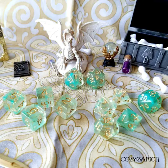Green Glitter Smoke Dice Set – 11-Piece Clear Resin Gold Font Extra D20 D6s