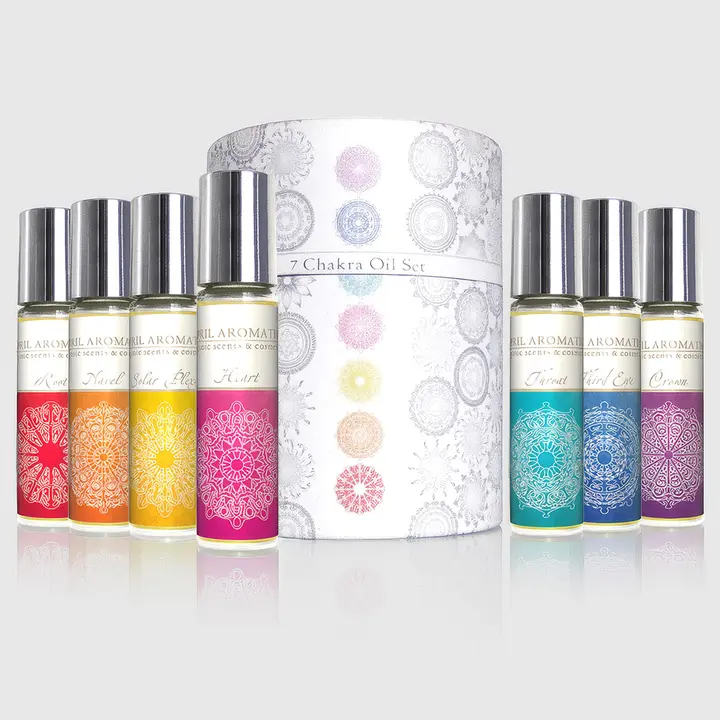 7 Chakra Oil Set — botanical chakra oils with gemstones for energy centers by April Aromatics, 7×10 ml