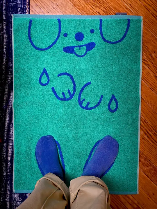 "WET DOGS" bath mat