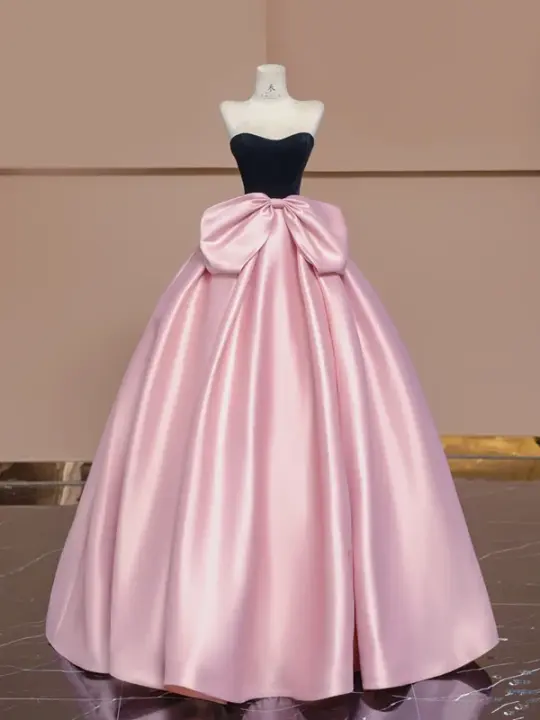 Black strapless bodice with a fitted waist and pink tulle skirt, a ball gown/bridal dress R8359
