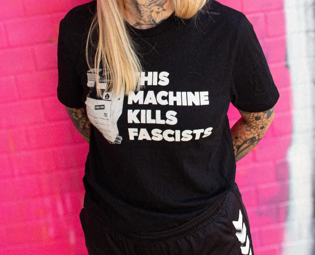 "This machine kills..." | FreeDes.net benefit shirt