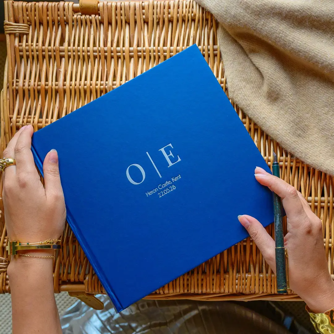 Square Handmade Wedding Photo Guest Book with Couple's Initials in a Striking Design