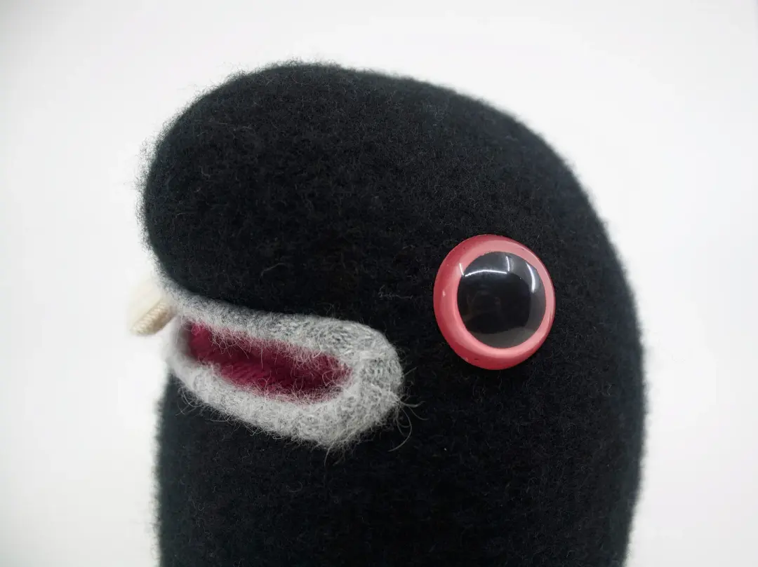 Woobie the fluffy plush angora sweater monster