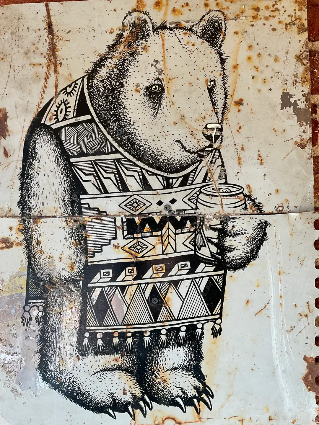 P. Bear on Reclaimed Metal