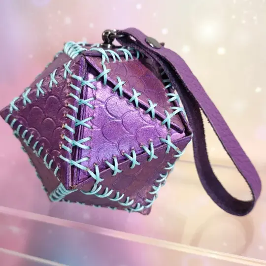 Leather dice bag embossed with scales