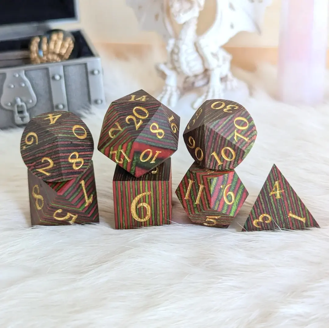 Green and Red Stripe Wood Dice Set – 7-Piece Layered Wooden DnD Dice | Fennek & Finch
