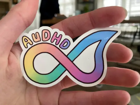 Colourful AuDHD symbol sticker