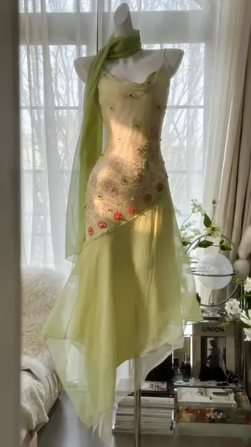 Light yellow-green halter-neck fitted long ball gown with an asymmetrical hem R7679
