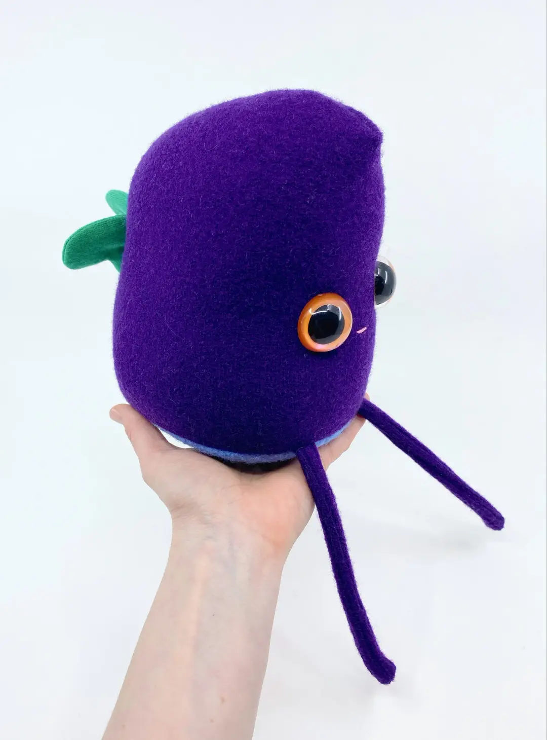 Jenny the purple monster with butterfly wings