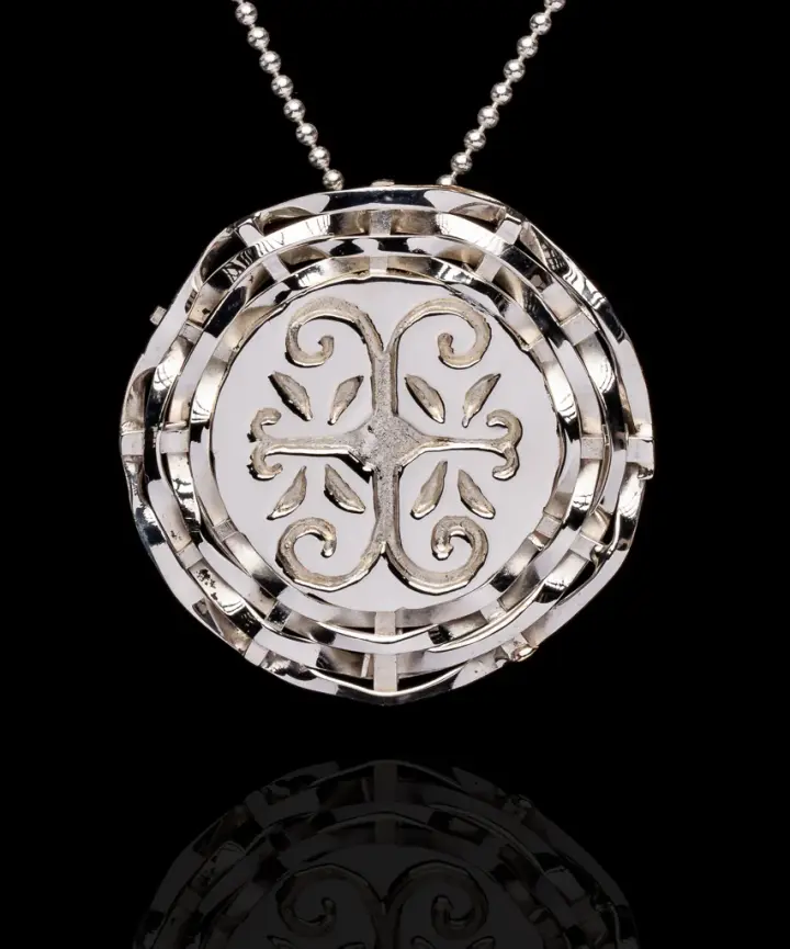 Wolastokiyik skicinuwihq,  people of the beautiful river, basket weave pendant