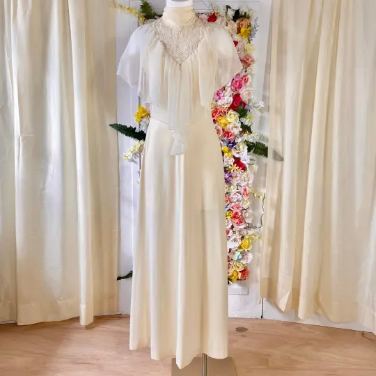 Sleeveless Butter Cream Dress with Sheer Yoke and High Modest Collar