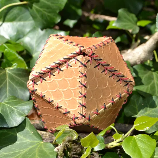 Leather dice bag embossed with scales