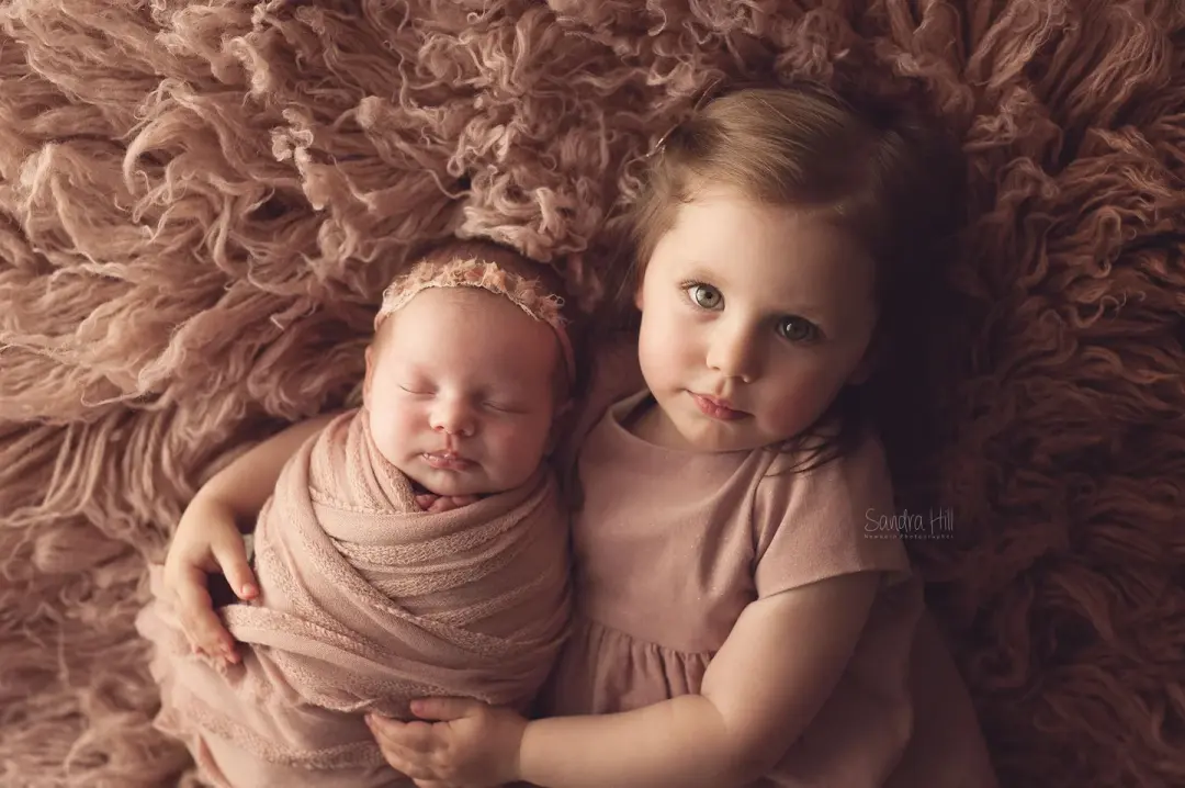 Pink knit ruffle wrap