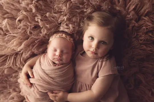 Pink knit ruffle wrap