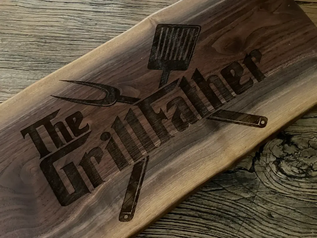 25L022 - Dual Live Edge “GrillFather” Engraved Walnut Board