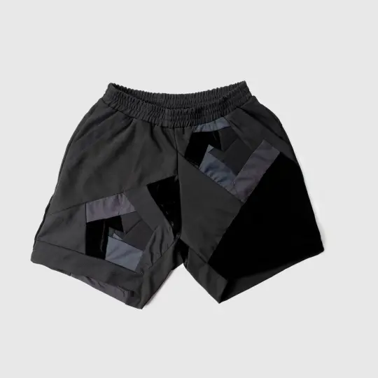 black 'all-over reroll' short