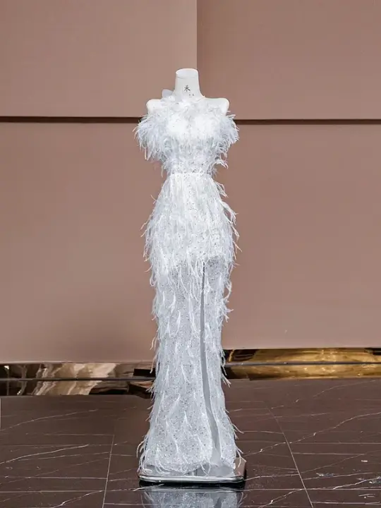 White strapless, fitted, sexy long ball gown with feather design; bridal gown R8320
