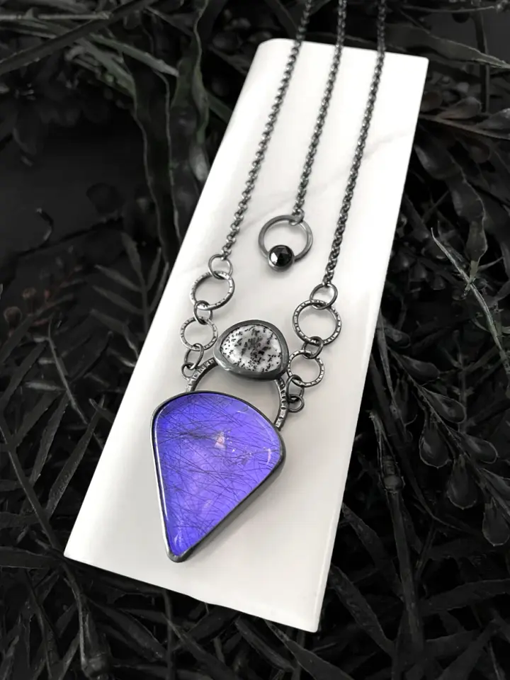 Rutilated Quartz Amulet with Purple Glow