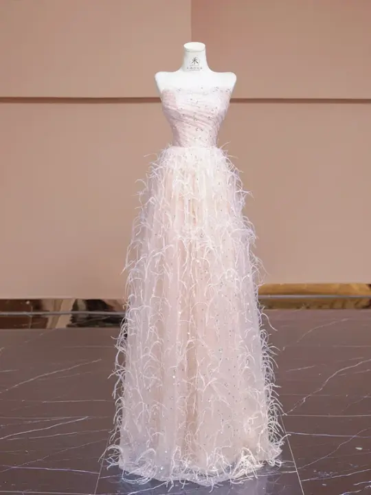 Light pink strapless, fitted waist, long ball gown with feather skirt design; bridal gown R8345